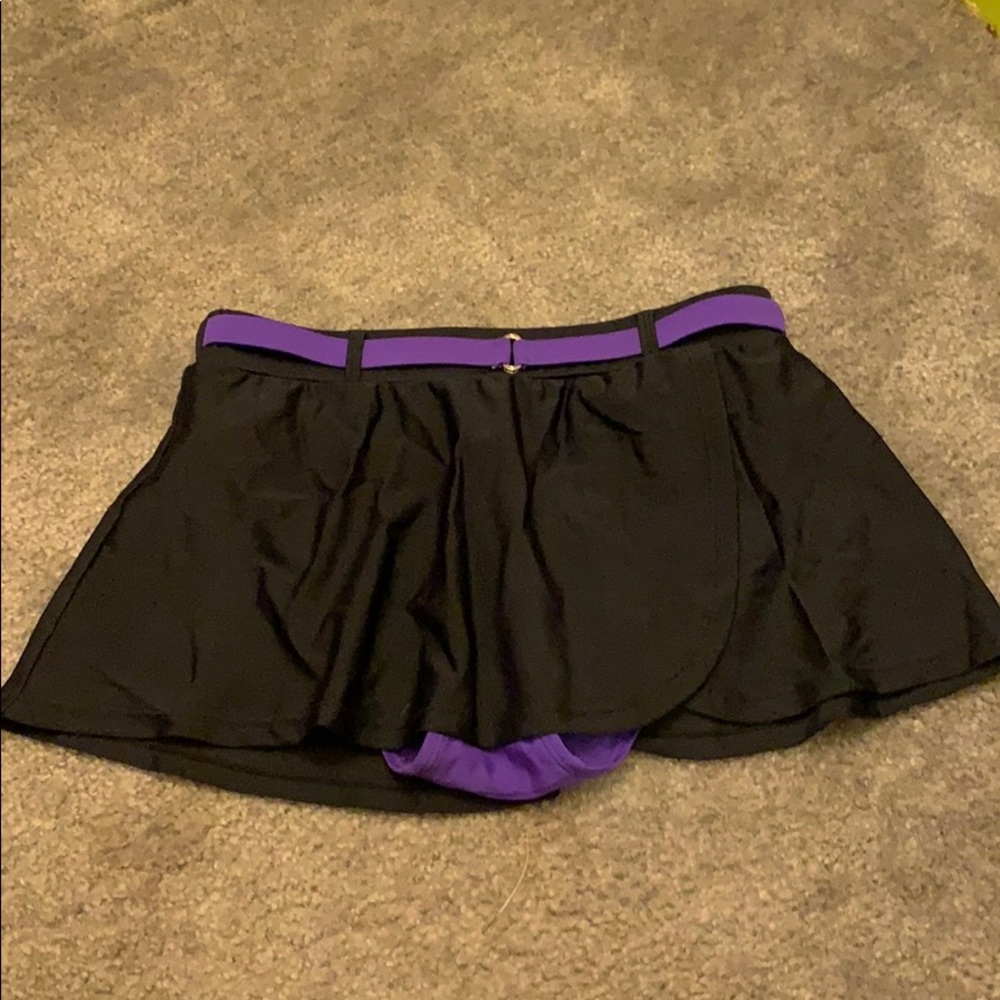 Purple and black baiting suit
